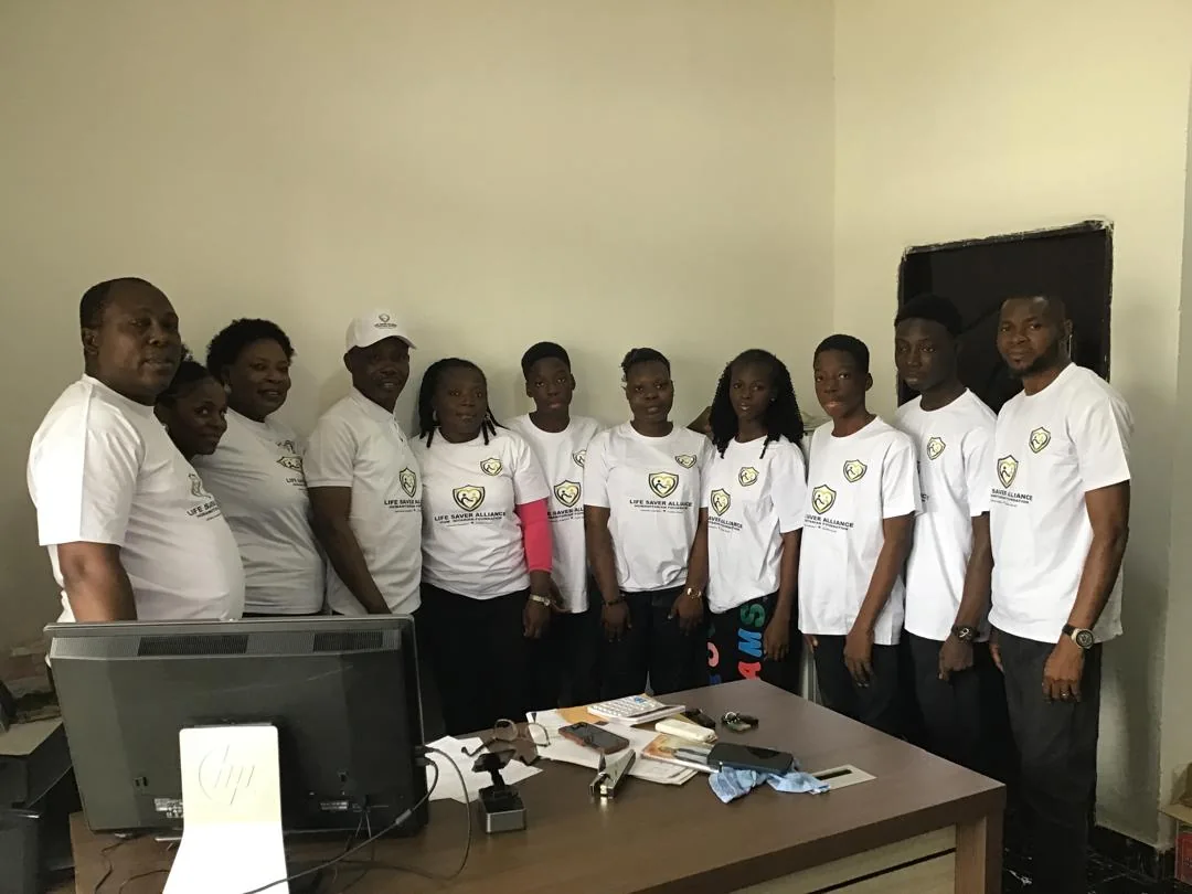 Members of the LAHF team gathered together in their office