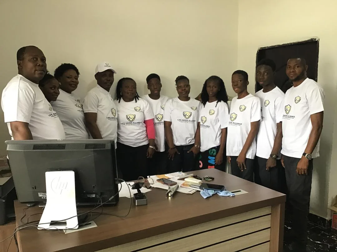 Members of the LAHF team gathered together in their office